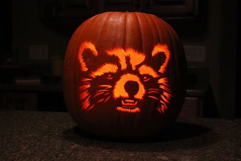 Rocket from Guardians of the Galaxy Guardians Of The Galaxy Pumpkin Carving, Rocket Pumpkin Carving, Racoon Pumpkin Carving, Pumpkin Carving Marvel, Raccoon Pumpkin Carving, Marvel Pumpkins, Marvel Pumpkin Carving, Marvel Pumpkin, Galaxy Pumpkin