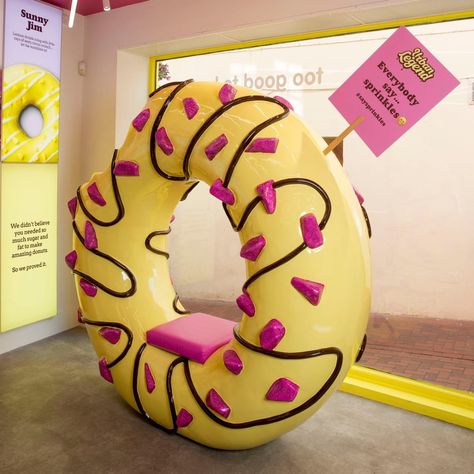 Brands - Urban Legend - 20.20 - Brand Experience Agency Donut Chair, Low Calorie Donuts, Super Donut, Donuts Shop, Cafe Design Inspiration, Donut Store, Giant Donut, Store Architecture, Kids Cafe