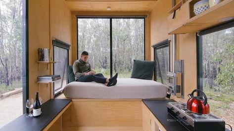 Take A Look Inside This Minimalist Tiny House With A King Size Sleeping Loft Minimalist Tiny House, Black Roller Blinds, Tiny House Company, Art Deco Hotel, Small Fridges, Bed End, Sleeping Loft, Dubai Hotel, Wood Interiors