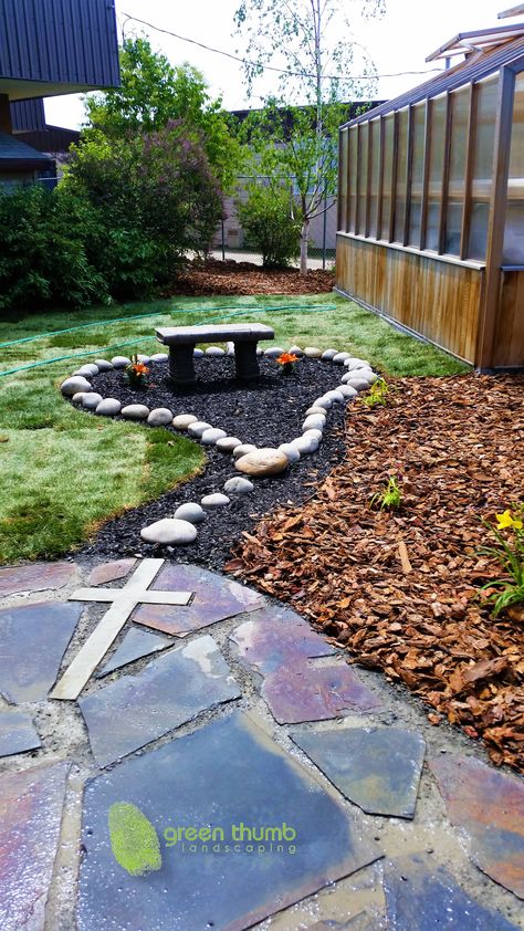 Rosary garden made for a Catholic elementary school. Using round washed rocks to create the rosary beads and a concrete cross cut into the flagstone we created a unique prayer garden for the children. Diy Grotto For Mary, School Garden Design, Rosary Garden, Marian Garden, Mary Garden, Prayer Garden, Catholic Decor, Meditation Garden, Sensory Garden