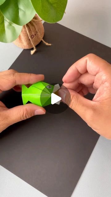 This fun and easy origami project is perfect for kids of all ages. It's also a great way to learn about the science of origami.

To make your own jumping frog, you'll need:

 A square piece of paper
 Scissors
 Glue

Instructions:

1. Fold the paper in half diagonally to create a triangle.
2. Fold the two bottom corners up to meet the top point.
3. Fold the two top corners down to meet the bottom edge.
4. Unfold the paper and open it Origami With Square Paper, Fish Paper Craft, How To Do Origami, Jumping Frog, Origami Step By Step, Paper Fish, Origami Gifts, Origami For Beginners, Origami Love