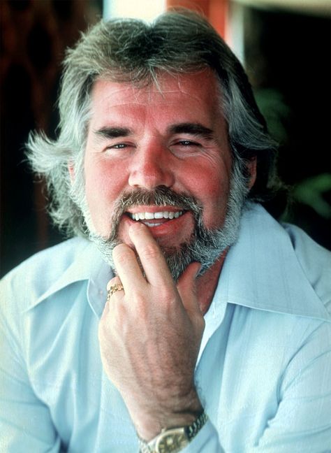 Kenneth Ray Rogers (August 21, 1938 – March 20, 2020) was an American singer, songwriter, actor, record producer, and entrepreneur. He was a member of the Country Music Hall of Fame. Though he was most successful with country audiences, Rogers charted more than 120 hit singles across various music genres, Islands In The Stream, American Bandstand, Kenny Rogers, Song Of The Year, Charming Man, Country Music Stars, Country Music Singers, Famous Singers, Music Business