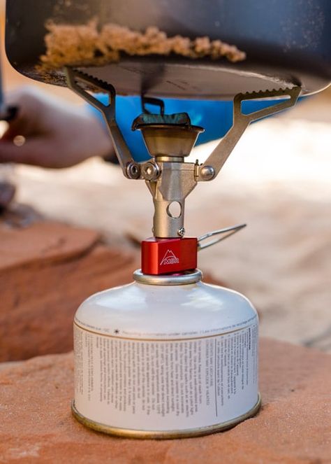 A good camping stove is essential for backcountry cooking. Find out whether a canister or liquid-gas stove is right for you. Best Camping Stove, Gas Canister, Backpacking Stove, Camping Stove, Gas Stove, Canisters, Backpacking, Stove, Camping