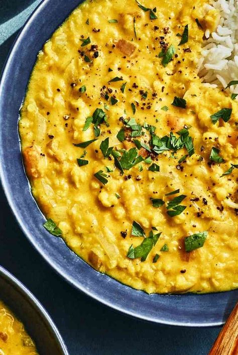 This coconut lentil recipe features coconut milk, turmeric, and ginger for a vegetarian curry perfect for serving with rice. Malagasy Coconut Lentils, Coconut Lentils Recipe, Coconut Dal Recipe, Coconut Milk Lentils, Turmeric Coconut Milk, Benefits Of Fresh Ginger, Coconut Lentils, Lentil Recipe, Dinner 2023