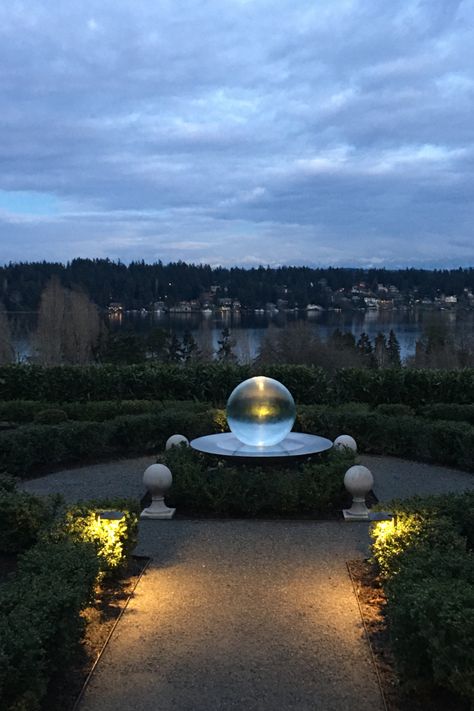 A moody and magical Aqualens at twilight ✨overlooking Lake Washington - mesmerizing! Contact us today to order! #spherefountain #gardendesign #gardenart #landscapedesign #waterfountain #waterfeature #luxurydesign #luxuryliving #gardendesignmag #orbfountain #gardensculpture #outdoorlivingspace #luxe #homesandgardens #houseandgarden #betterhomesandgardens #outdoorfountain #indoorfountain #gardenfountain #gardenwaterfeature #aqualens #allisonarmour #allisonarmourart #gardeninspiration Zen Garden Landscaping, Contemporary Outdoor Fountains, Sphere Fountain, Backyard Garden Landscaping, Water Feature Ideas, Courtyard Fountain, Japanese Garden Zen, Modern Water Feature, Fountain Garden