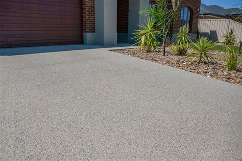 Snowy Mix exposed aggregate driveway  http://www.mawsons.com.au/home Polished Concrete Driveway, Grey Aggregate Driveway, Aggregate Concrete Driveway, Types Of Concrete Finishes, Honed Concrete Driveway, Dark Grey Concrete Driveway, Dark Exposed Aggregate Driveway, Imprinted Concrete Driveway, Repair Concrete Driveway