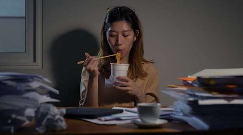 This isn’t the first study to show a link between late night eating and weight gain. Credit: <a class="source" href="https://www.shutterstock.com/image-photo/asian-businesswoman-eating-noodles-cup-junk-2175675261">MMD Made my dreams/ Shutterstock</a> Meal Schedule, Beginner Workout At Home, Metabolic Disorders, Eating At Night, Late At Night, Adipose Tissue, Late Night Snacks, Feeling Hungry, Weight Control