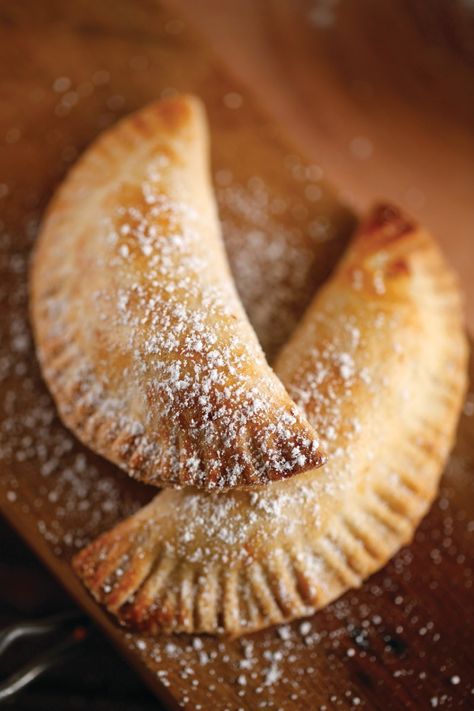 I grew up with my mom making fried apple pies. I loved them then and now. I have put a twist on her recipe by baking the pies in the oven. I use my homemade olive oil pie crust to enrobe the cooked… Baked Apple Hand Pies, Olive Oil Pie Crust, Homemade Olive Oil, Oven Baked Apple, Oil Pie Crust, Fried Apple, Fried Apple Pies, Hand Pie Recipes, Apple Hand Pies