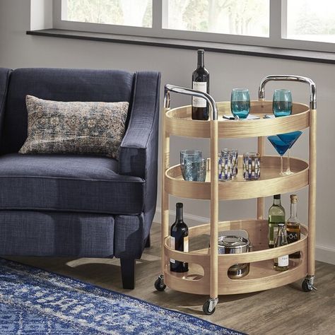 Wade Logan® Waupaca 27.26'' Wide Oval Bar Cart & Reviews | Wayfair Round Bar Cart, Wood Cart, Wood Bar Cart, Kitchen Trolley, Bar Essentials, Ice Buckets, Kitchen Roll, Chrome Handles, Wood Countertops