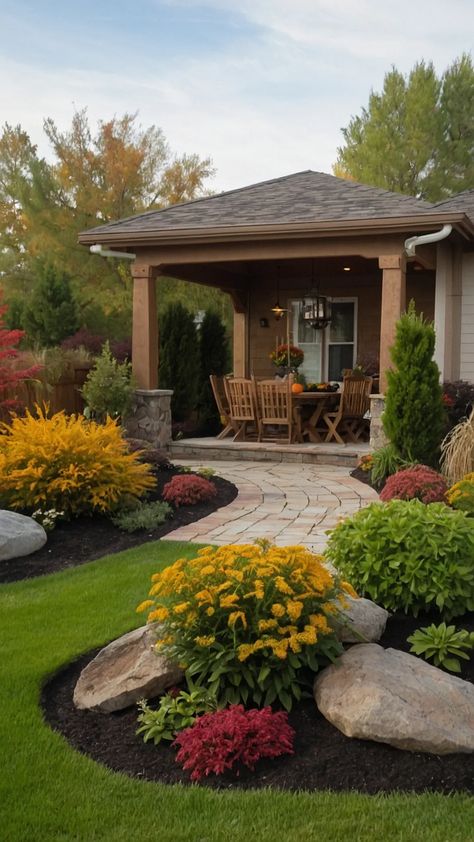 Harvest Happiness: 15 Fall Garden Ideas for Vegetables and Aesthetics - Inspire Inlet Fall Landscape Front Yard Garden Ideas, Beautiful Landscaping Front Yard, Backyard Plants Ideas, Landscaping Around Patio Ideas, Landscaping Aesthetic, Pots In Flower Beds Landscaping, Fall Garden Aesthetic, Dark Mulch Landscaping, Front Yard Landscape Design