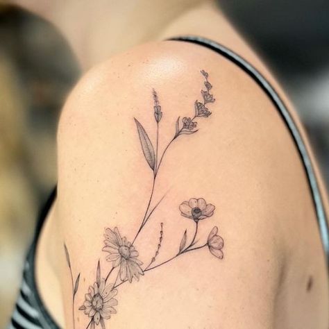 Casey ryder on Instagram: "Floral wrap for Marly 🙃 #chamomile #lavender and #buttercup . . . #tattoo #mainetattooartists #mainetattoo #maine #portlandmaine #nhtattoo #finelinetattoo #fineline #black #ink #art #artist #maineartist #portlandoldport #flower #flowertattoo #realismtattoo #floraltattoo" Lavender And Chamomile Tattoo, Chamomile Flower Tattoo, Buttercup Flower Tattoo, Coneflower Tattoo, Chamomile Tattoo, Buttercup Tattoo, Maine Tattoo, Marigold Tattoo, Delicate Flower Tattoo