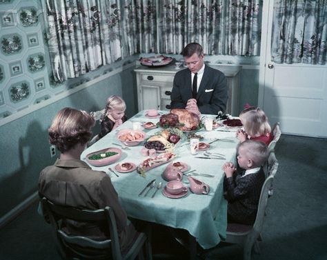 Father says grace before an iconic looking 1950s family tucks into their lovely Thanksgiving dinner. #family #1950s #fifties #food #Thanksgiving #vintage Saying Grace, Nuclear Family, Vintage Housewife, Vintage Family, Vintage Thanksgiving, Those Were The Days, Vintage Life, Days Gone, Good Old Days