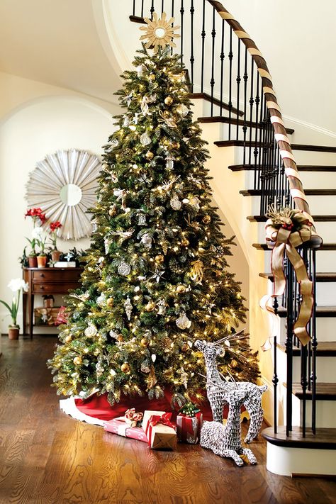 Wrap your staircase banister in ribbon rather than live garland -- it's easier on pets and on your bank account. Christmas Banister, Christmas Stairs Decorations, Christmas In America, Christmas Palette, Christmas Stairs, Christmas Staircase, Holiday Mantel, Christmas Party Themes, Holiday Greenery