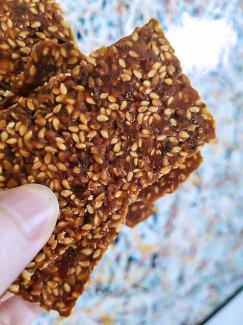 Sugar Free Keto Sesame Snaps | Mad Creations Hub Sesame Brittle Recipe, Sesame Brittle, Sesame Snaps, Sugar Free Biscuits, Sesame Seeds Recipes, Sesame Cookies, Seed Bars, Low Carb Crackers, Peanut Butter Snacks