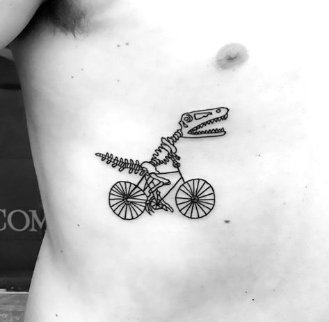 A funny and creative tattoo of a dinosaur skeleton riding a bike. Color: Black. Tags: Cool, Creative, Funny Bike Tattoo, Dinosaur Tattoo, Dinosaur Tattoos, Bike Tattoos, Skeleton Tattoos, Weird Tattoos, Funny Tattoos, Best Friend Tattoos, Friend Tattoos