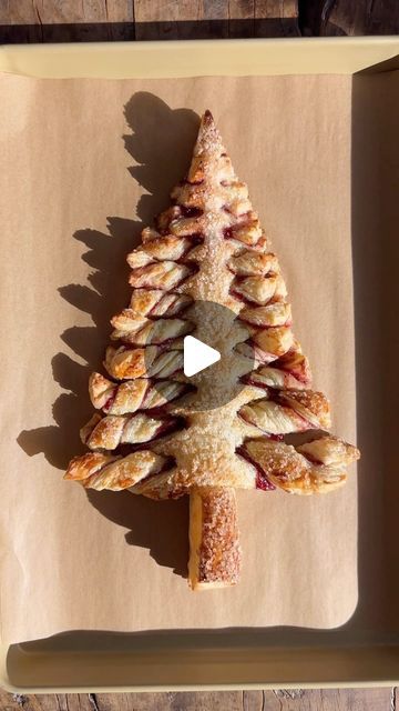 Kelly Senyei | Just a Taste® on Instagram: "EASY PUFF PASTRY CHRISTMAS TREE! 🎄

It’s Day 2 of our PUFF PASTRY 101 series and we’re diving into the most festive treat of the holiday season! 🥐 I’ve sandwiched together two sheets of flaky pastry with raspberry jam to make this tree, but any spreadable filling will do, including basil pesto, olive tapenade, Nutella and cookie butter! ❤️

👉🏻 COMMENT with the word TREE and I’ll DM you the clickable recipe link!

#puffpastry #christmas #christmastree #christmasmorning #holidaybreakfast #christmasbrunch #puffpastryrecipes" Puff Pastry Christmas Tree Cinnamon Roll, Puffy Pastry Christmas Trees, Puff Pastry Christmas Tree Cinnamon Sugar, Xmas Bread Ideas, Puffed Pastry Christmas Tree, Puff Pastry Jam Recipes, Christmas Tree Dessert Ideas, Puff Pastry Recipes Christmas, Puff Pastry Tree