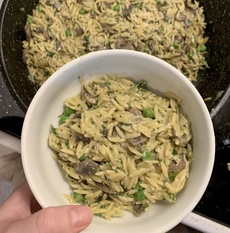 Creamy Garlic Parmesan Orzo with Green Peas Looking for a creamy, comforting, and delicious side dish or main meal? This orzo recipe is rich, cheesy, and loaded with flavor, perfect for a cozy night in or an impressive dinner party dish! Ingredients: 1 cup orzo pasta 2 tbsp olive oil 3 cloves garlic, minced 1/4 cup onion, finely chopped 1 3/4 cups chicken or vegetable broth 1/2 cup heavy cream 1 cup grated Parmesan cheese 1 cup green peas (frozen or fresh) Salt and pepper to taste Fresh par... Mushroom Spinach Orzo, Garlic Parmesan Orzo, Mushroom Orzo, Spinach Orzo, Parmesan Orzo, Orzo Recipe, Mushroom Spinach, Dinner Party Dishes, Impressive Dinner