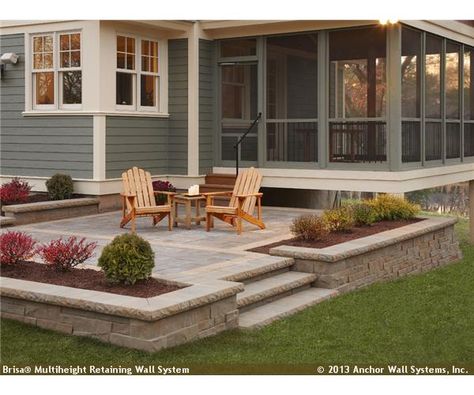 Raised patio featuring Brisa® wall system Patio Plan, Concrete Paver Patio, Raised Patio, Cozy Backyard, Farmhouse Front Porches, House With Porch, Outside Living, Backyard Deck, Porch Design