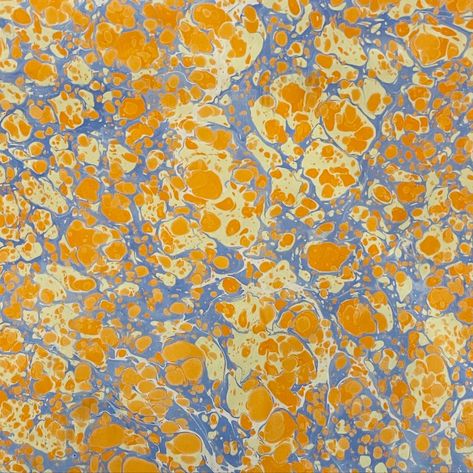 Organized chaos? Welcome to my marbling home studio! Check out this fresh orange and blue marbled paper drying like it’s auditioning for the next big art show. The thickened water tray and paint brushes are just here for moral support. Feeling inspired? Join a workshop and dive into the marbling madness! Marble Dust Art, Marble Dust Powder Art, Water Marble, Marbling Paper, Marbled Paper, Marbling, Marblized Paper, Marbled Endpapers, Hand Marbled Paper