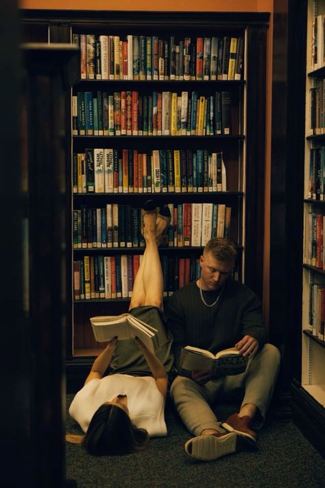 Couple Book Photoshoot, Romance Vintage Aesthetic, Library Pre Wedding Shoot, Bookish Engagement Photos, Bookstore Engagement Photos, Library Couple Photoshoot, Couple Reading Together Aesthetic, Couple In Library, Reader Couple