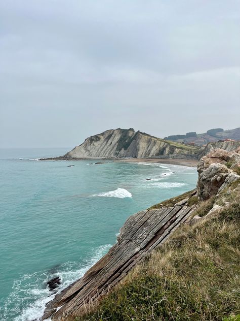 #Flysch #Zumaia #Spain #NorthernSpain #BasqueCountry #RollingHills #RockFormation #UNESCO #Geopark #Trail #Beach #Ocean #Green #Blue #Aqua Basque Country Spain, Traveling To Spain, May Days, Northern Spain, May Day, Basque Country, Public Transportation, Solo Female Travel, San Sebastian