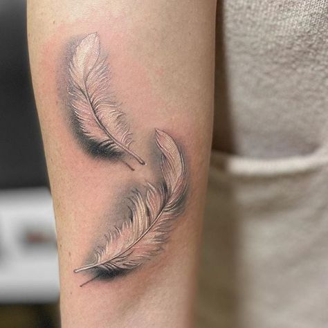 Feather Dragonfly Tattoo, Feather Tattoos On Wrist, Elegant Feather Tattoo, Feather Wrap Around Tattoo, Floating Feather Tattoo, 3d Feather Tattoo, Realism Feather Tattoo, Black And White Feather Tattoo, Womens Feather Tattoos