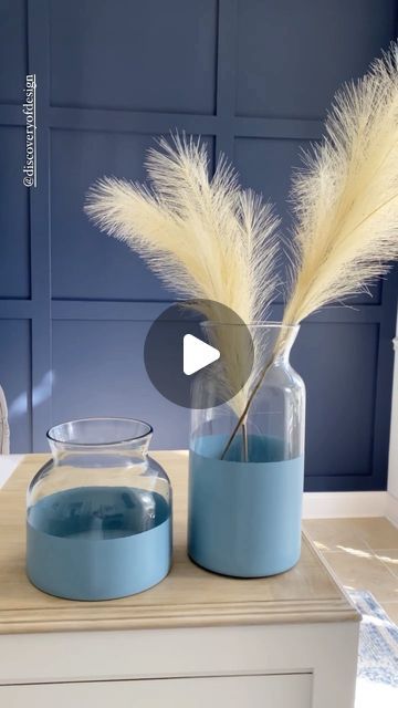 Tina Krider on Instagram: "DIY Painted vase dupe ⬇️ DETAILS You can DIY this Serena & Lily designer dipped vase for $30 using a Target hack. These target glass vases were originally $25 each. I was bored with the clear version so I masked them off with painters tape to create a simple DIY designer up cycle. You can spray directly to the glass and in under an hour have a dupe in your own custom color! Just mark off your glass with a sharpie and apply your tape around, pressing firmly to get good adhesion. Then just scrub glass with a magic eraser to get a perfectly smooth & clean surface. I covered the remaining portion of the vases with a plastic bag and then sprayed each vase with two thin coats of my favorite blue color. After allowing to dry completely, I carefully peeled the Simple Glass Painting Designs, Target Glass, Target Hacks, Diy Painted Vases, Family Room Layout, Painting Glass Jars, Painted Glass Vases, Up Cycle, Glass Painting Designs