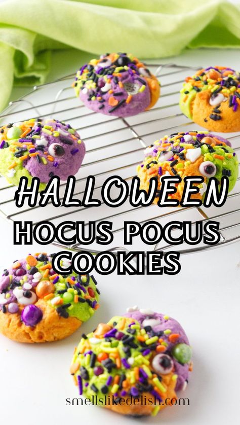 These Hocus Pocus Cookies are a simple sugar cookie recipe that color
 with food colors. Roll the cookies in sprinkles and add candy eyes for 
extra spooky, Hocus Pocus themed fun. 
Your kids will love showing these colorful sugar cookies off in their school lunches! Hocus Pocus Cookies, Simple Sugar Cookie Recipe, Colored Cookies, Halloween Snack Mix, Candy Eyes, Sugar Cookie Recipe Easy, Homemade Popcorn, Kid Approved Meals, Simple Sugar