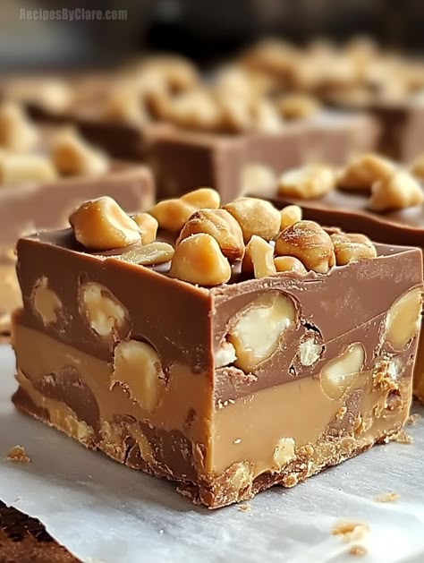 Decadent Snickers Fudge with layers of chocolate, peanut butter, marshmallow crème, and caramel. A sweet, satisfying treat! Snicker Fudge Recipe, Marshmallow Crème Fudge, Snickers Fudge Recipe, Snicker Fudge, Goodie Plates, Fudge With Marshmallows, Snickers Recipes, Fudge With Marshmallow Cream, Marshmallow Crème