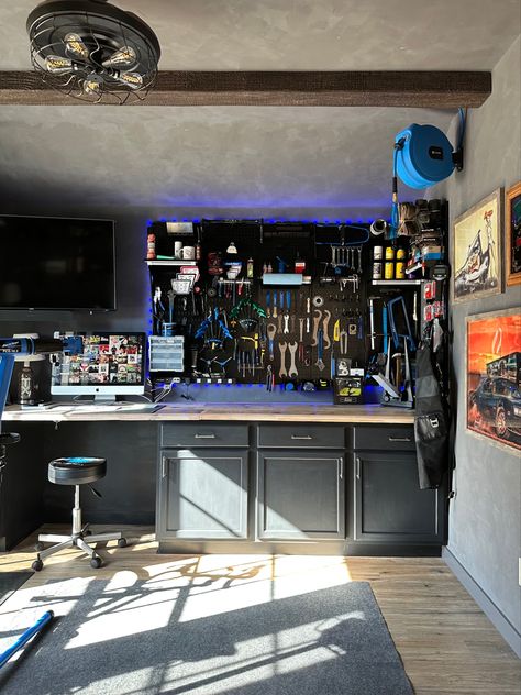 Built my husband a man cave/bike shop and now he’s always in here working! The faux beams came from @ekenamillwork and for the tool wall i used @wallcontrol. #bikeshop #mancave #mancaveideas #fauxromanclay #romanclay #walltexture #workshop #toolorganization #toolwall #wallcontrol Diy Man Cave, Officine In Garage, Roman Clay, Small Man Cave, Cave Design, Unfinished Cabinets, Man Cave Shed, Tool Wall, Home Library Rooms