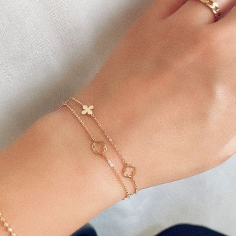 Drape yourself in elegance with our Double Chain Flower Petal Bracelet! 🌼✨ Crafted in luxurious 14k gold and hallmarked for authenticity, this bracelet features a divine design with two delicately intertwined chains. Elevate your style effortlessly with this timeless piece. Embrace sophistication with Arlois! 💫 #goldbracelet #jewelrygram #solidgoldjewellery #gifts #14kgold #14kgoldjewelry #14ctgold Shop now for 10% off & free worldwide shipping: https://arlois.com/products/double-chain-flo... Gold Flower Bracelet, Double Chain Bracelet, Clover Bracelet, Solid Gold Bracelet, Divine Design, Bracelet Dainty, Flower Petal, Double Chain, Solid Gold Jewelry