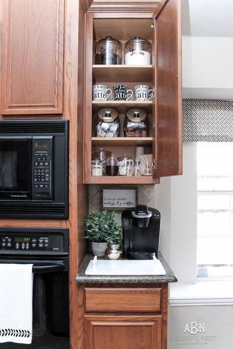 This is such a great idea! Transform a dead cabinet space with these coffee cabinet organization ideas! See more on http://ablissfulnest.com/ #coffee #coffeestation Coffee Bar Ideas Kitchen Counter, Coffee Cabinet, Coffee Station Kitchen, Coin Café, Coffee Bar Station, Coffee Area, Coffee Stations, Diy Coffee Bar, Home Coffee Stations