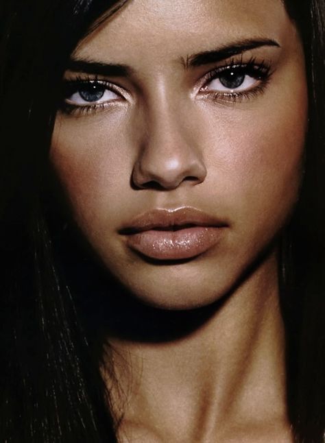 Adriana Lima, Brazilian fashion model. She is best known as a Victoria's Secret Angel, and as a spokesmodel for Maybelline cosmetics.  In 2012, she came in 4th on the Forbes top-earning models list, estimated to have earned $7.3 million in one year. She has appeared in  Harper's Bazaar, ELLE, GQ, Arena, Vogue, V, Esquire, Marie Claire, & Cosmopolitan magazines, and modeled for Valentino, Vera Wang, bebe, Armani, Versace, BCBG, Guess?, Louis Vuitton and others. She identifies as Afro-Brazilian. Adriana Lima Face, Lima Model, Adriana Lima Young, Editorial Vogue, Vogue Editorial, Thick Eyebrows, Farrah Fawcett, Vogue India, Linda Evangelista