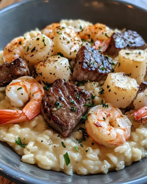 Seafood and Steak Risotto is a luxurious surf-and-turf delight that combines tender steak and fresh seafood with creamy, flavorful risotto. This dish brings the best of both worlds onto one plate, perfect for a special dinner or whenever you feel like indulging. It’s a gourmet meal that’s surprisingly simple to prepare! Surf And Turf Risotto, Steak With Seafood Topping, Steak And Seafood Skillet, Steak And Crab Meat Recipes, Risotto And Steak, Easy Surf And Turf Recipes, Steak And Seafood Dinner Ideas, Steak And Risotto, Steak Risotto