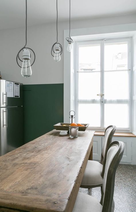 An Organic and Simple Home in Switzerland: Island seating needn't be limited to stools: these thrifted chairs provide a formal dining experience at an rustic antique island.  Kitchen Island Breakfast Bar Ideas & Inspiration | Apartment Therapy Half Painted Walls, Galley Wall, Gorgeous Apartment, Half Walls, Kitchen Lights, Breakfast Bar Kitchen, Painted Walls, Island With Seating, Antique Kitchen