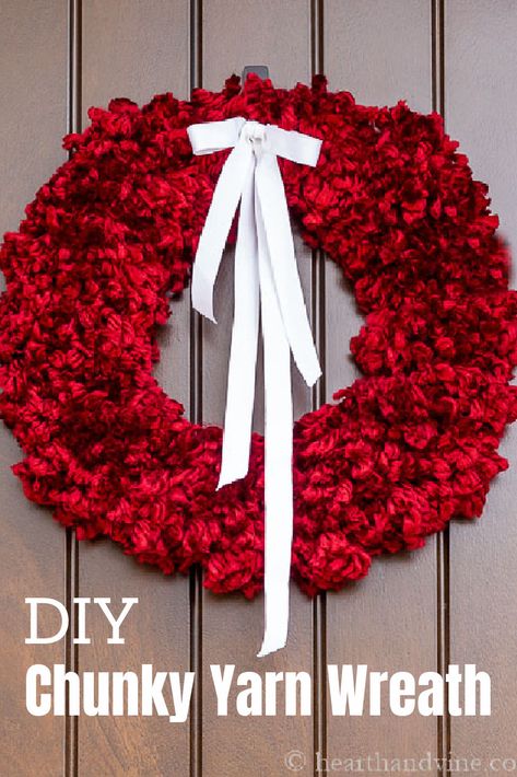 Bright and cheery this red chunky pom pom wreath is easier to make than you might think. Diy Chunky Yarn, Diy Pom Pom Wreath, Easy Pom Pom, Lush Christmas, Christmas Booth, Valentine Wreath Diy, Pom Wreath, Wreath Frames, Pom Pom Wreath