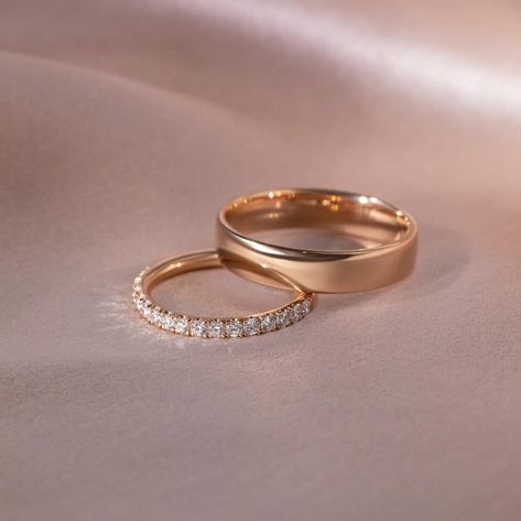 Exquisite Pairs ✨ Wedding band pairs for a couple have a deep-rooted history. The tradition dates back to ancient Egypt, around 3,000 BCE. The Egyptians are known to be the earliest users of rings to symbolize love and commitment. They crafted rings from materials like braided reeds, hemp, or leather, which were later replaced by more durable metals. The circular shape of the ring, with no beginning or end, symbolized infinity, and was traditionally worn on the fourth finger of the left han... Wedding Band And Engagement Ring Pairing, Marriage Rings Couple, Christian Wedding Rings, Wedding Band Couple, Christian Wedding Dress, Couple Together, Couple Ring Design, Couples Wedding Bands, Jewellery Photography