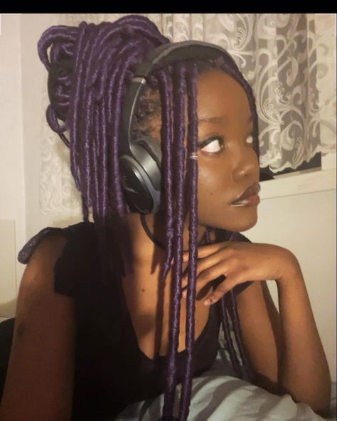 alt gothic black girl side profile purple faux locs messy bun Black And Purple Locs Black Women, Colored Braids Aesthetic, Purple Dreadlocks Black Women, Black And Purple Faux Locs, Faux Locs Side Part, Black Woman With Purple Hair, Purple Faux Locs Black Women, Dreads Side Profile, Black Women Purple Hair