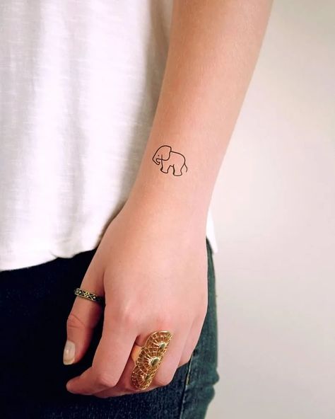 20+ Irresistibly Adorable Mini Elephant Tattoo Inspirations - WomenSew Mini Elephant Tattoo, Minimal Elephant Tattoo, Elephant Tattoo Ideas, Small Animal Tattoos, Tiny Designs, Elephant Tattoo, Elephant Tattoos, Animal Tattoos, Small Pets