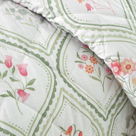 Capture the essence of the cottage core aesthetic with this delicate cameo floral pattern in soft, muted tones. Fully reversible with of classic ribbon florals and stripes to bring a touch of vintage charm. Created from easy-care recycled polyester and soft responsibly sourced cotton, blended together for everyday use. Quilted for added style and comfort, perfect for added insulation during sleep. Soft Spring Aesthetic, Laundry Gifts, Floral Bedspread, Catherine Lansfield, Cottage Aesthetic, Soft Spring, Cottage Core Aesthetic, Floral Duvet, Reversible Duvet Covers