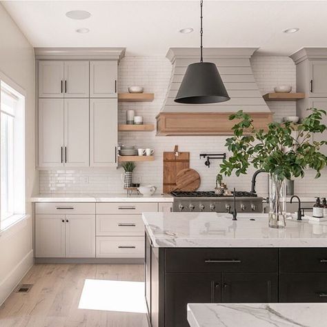 this kitchen is perfect, with it's greige cabinetry, wood accents and dark black island and lighting. Greige Kitchen, Porcelain Countertops, Beige Kitchen, Gorgeous Kitchens, Black Kitchen, White Kitchen Cabinets, Updated Kitchen, Black Kitchens, Kitchen Shelves