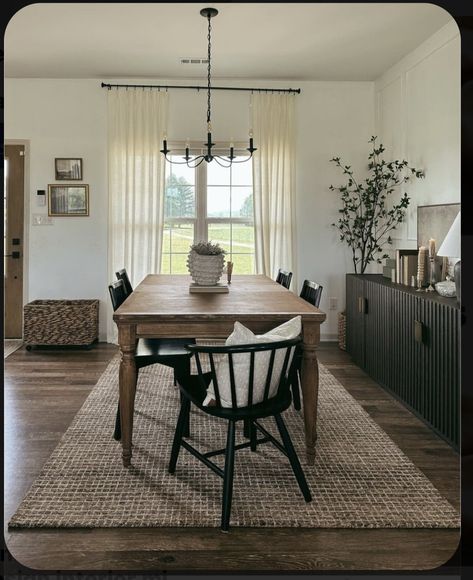 Wood Floor Dining Room Ideas, Dark Floors Dining Room Table, Modern Classic Apartment Decor, Modern Dining And Living Room Combo, Black White And Tan Dining Room, Dining Table Next To Window, One Kindesign Kitchen, Dark Hardwood Floor Dining Room, Dining Room Hygge