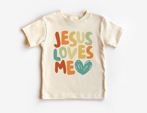 Jesus Loves Me Toddler Shirt - Christian Kids Clothing - Boho Natural Toddler & Youth Tee If you love super soft, lightweight, extremely comfy shirts and baby bodysuits then you will absolutely love our unisex kids shirts and baby bodysuits! These shirts are hand printed with a professional garment printer for a soft, durable, long lasting, printed graphic using high quality water based inks. * The printed design is very soft to the touch due to our printing process blending the eco-friendly ink Kids Christian Shirts, Kids Tees Design, Christian Kids Shirts, Baby Shirt Design, Christian Tshirt Design, Christian Kids, Love My Kids, Christian Tees, Comfy Shirts