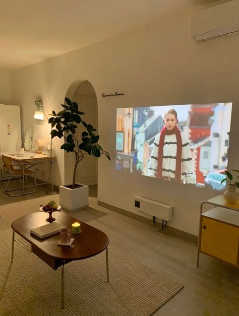 Projector In Studio Apartment, Cozy Simple Apartment, Living Room Designs With Projector, Nyc Studio Apartment Ideas Small Spaces, No Wall For Tv In Living Room, Projector Living Room Set Up, Projector Instead Of Tv Living Rooms, Room With A Projector, Nordic Studio Apartment