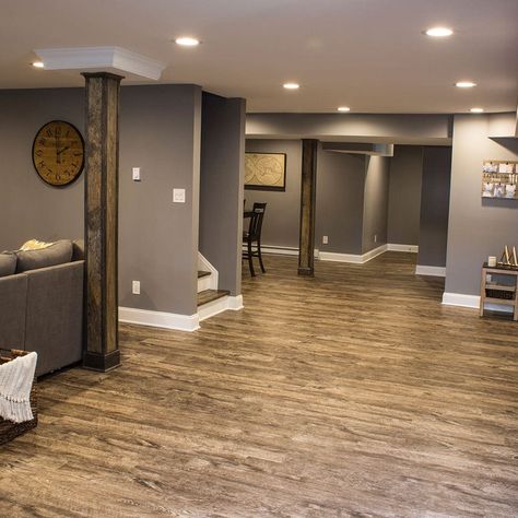 75 Underground Basement Ideas You'll Love - November, 2024 | Houzz Finished Basement With Stairs In Middle, Basement No Natural Light, Basement With No Windows Ideas, Basement Mansion, Diy Basement Bedroom, Bedroom In Basement Ideas, Large Basement Ideas Layout, Narrow Basement Layout, Basement Master Suite Ideas