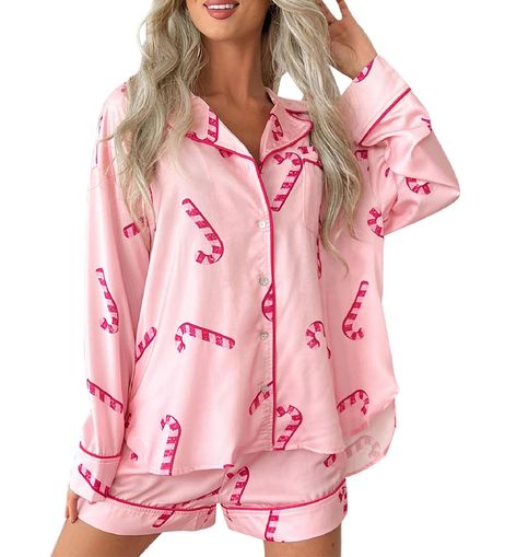 PRICES MAY VARY. Material: High quality polyester. women cute printed 2 piece pajamas set, lightweight, skin-friendly, comfortable and breathable, slight stretch, not easy to deform, suitable for Christmas, Hollween, Valentine's Day, etc. Feature: Christmas cane long sleeve shorts set, Xmas pajamas set, holiday loungewear set, Holiday cute pattern long sleeve button down shirt with shorts matching set, 2 pcs sleepwear set, 2 piece sleepwear button down pjs set. Design: Women 2 piece holiday pink Christmas Pajamas Shorts, Women Christmas Pajamas, Christmas Pajama Shorts, Christmas Loungewear, Pajamas Shorts, Womens Christmas Pajamas, Xmas Pajamas, Pyjama Satin, Cute Sleepwear