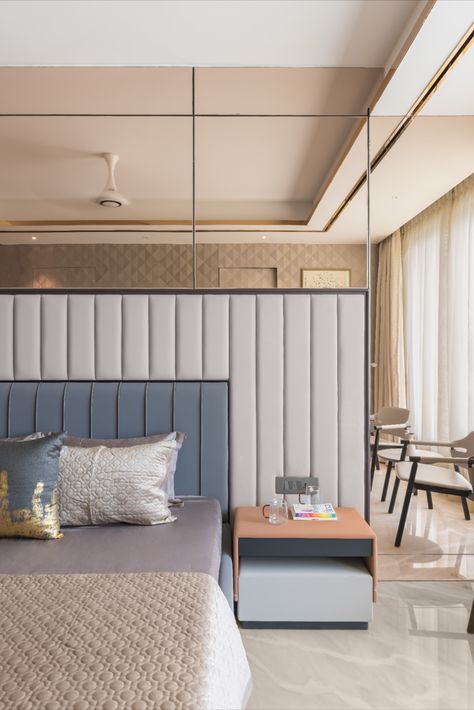 ‘The other master bedroom has a utilitarian layout, with an island bed and ample storage space. ‘The floor, ceiling and furniture is finished with soft greys, in different textures. The designers’ eye to detail is apparent here with the continuous lines of the cupboard partitions merging with the grouting of the floor, exemplifying visual symmetry. Contemporary Bedroom Design Luxury, Island Bed, Contemporary Bedroom Design, Arched Headboard, Living Room Tv Unit, Modern Bedroom Interior, Door Glass Design, Round Beds, Floor Ceiling