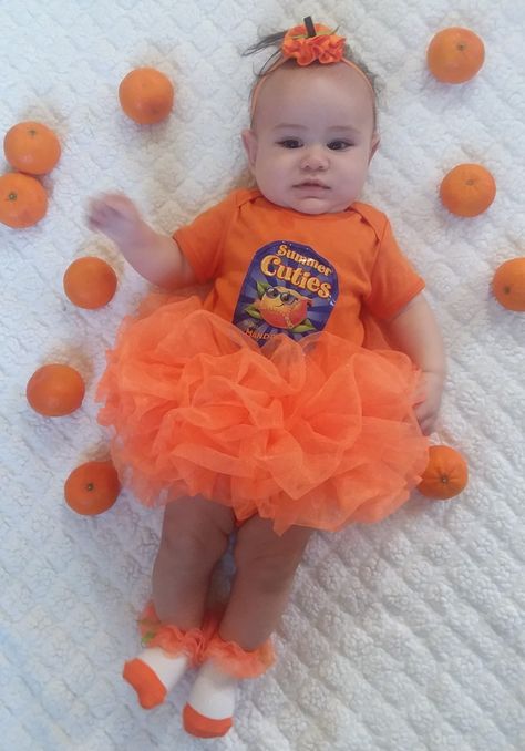 This year for my daughter's first Halloween I turned her into a 'cutie'. I purchased a plain orange onesie from amazon and sewed on an actual cuties logo from a bag. The tutu, socks, and headband came together in a set. The costume was an absolute hit! Cutie Orange Halloween Costume, Orange Costume Ideas, Orange Halloween Costume, Tutu Socks, Nicu Crafts, Orange Costume, Old Halloween Costumes, Newborn Halloween Costumes