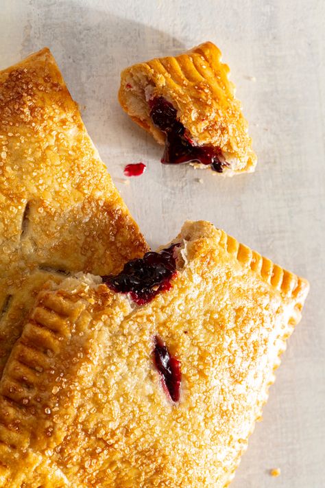 Turning pie into a handheld package puts all the best qualities of cherry-filled pastry within your grasp. Cherry Hand Pies, Cooks Country, Types Of Pastry, Donut Toppings, Caramel Chocolate Bar, Illustrated Recipe, Cookie Toppings, Caramel Tart, Milk Street