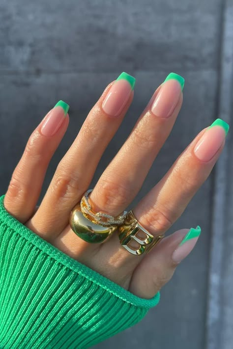 Bold and Chic: Show off your style with vibrant green French tips on elegant square-shaped nails for a striking pop of color against a nude base. These stunning nails effortlessly combine boldness and simplicity, creating a captivating look that's bound to make heads turn. Discover the beauty of this mesmerizing shade of green! ✨ // Photo Credit: Instagram @gelsbybry French Tip Color Nails Square, Green Nail Designs French Tips, Nail Art Summer Square, Colourful French Tip Nails Coffin, French Tip On Different Nail Shapes, Color Tip Acrylic Nails, Nails With Colored French Tips, Square Colored French Tip Nails, Colorful French Nails Square